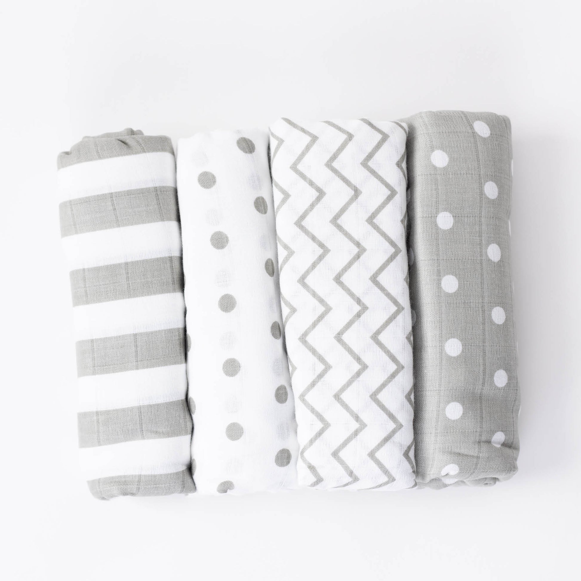 CuddleBug Muslin Cotton Swaddle Blankets (4 Pack) – Spots n' Stripes design. Made from 100% premium muslin cotton, these extra-large, breathable 4x4 ft swaddles provide lightweight comfort and cozy security for better sleep.