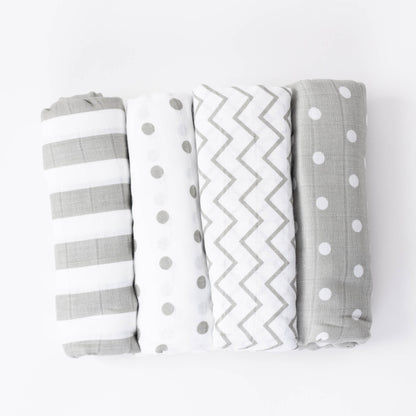 CuddleBug Muslin Cotton Swaddle Blankets (4 Pack) – Spots n' Stripes design. Made from 100% premium muslin cotton, these extra-large, breathable 4x4 ft swaddles provide lightweight comfort and cozy security for better sleep.