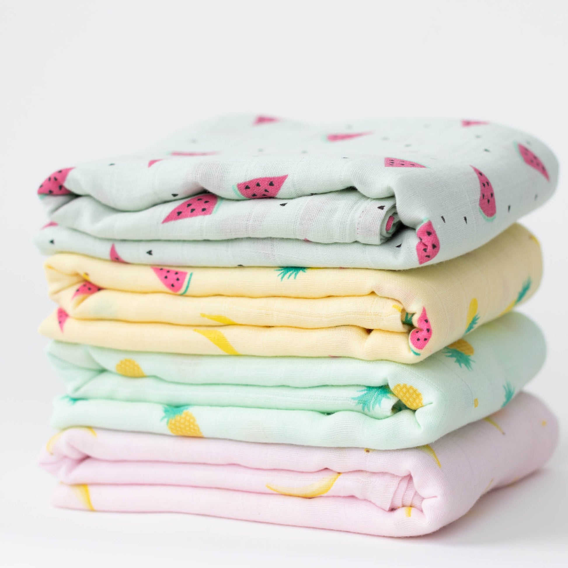 CuddleBug Muslin Cotton Swaddle Blankets (4 Pack) – Tutti Frutti design. Made from 100% premium muslin cotton, these extra-large, breathable 4x4 ft swaddles provide lightweight comfort and cozy security for better sleep.