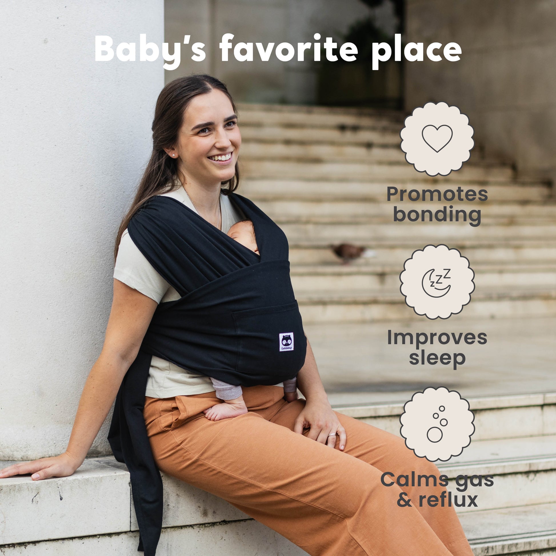 CuddleCarry™ Easy-Wear Baby Wrap Carrier in Black – a lightweight, T-shirt-style baby wrap offering a snug, hands-free fit for newborns to toddlers (8-35 lbs). Ergonomic, adjustable, and designed for all body types (XS-XXL).